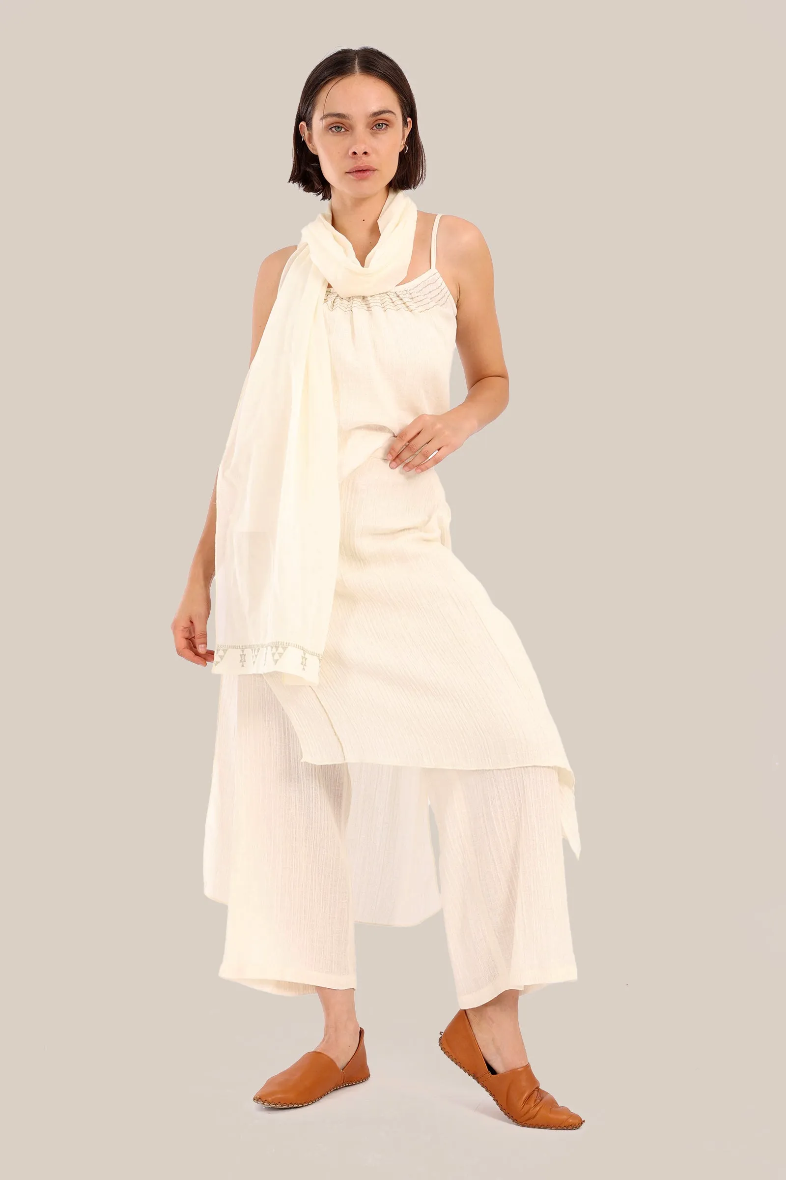 Pants with an embroidered asymmetric skirt