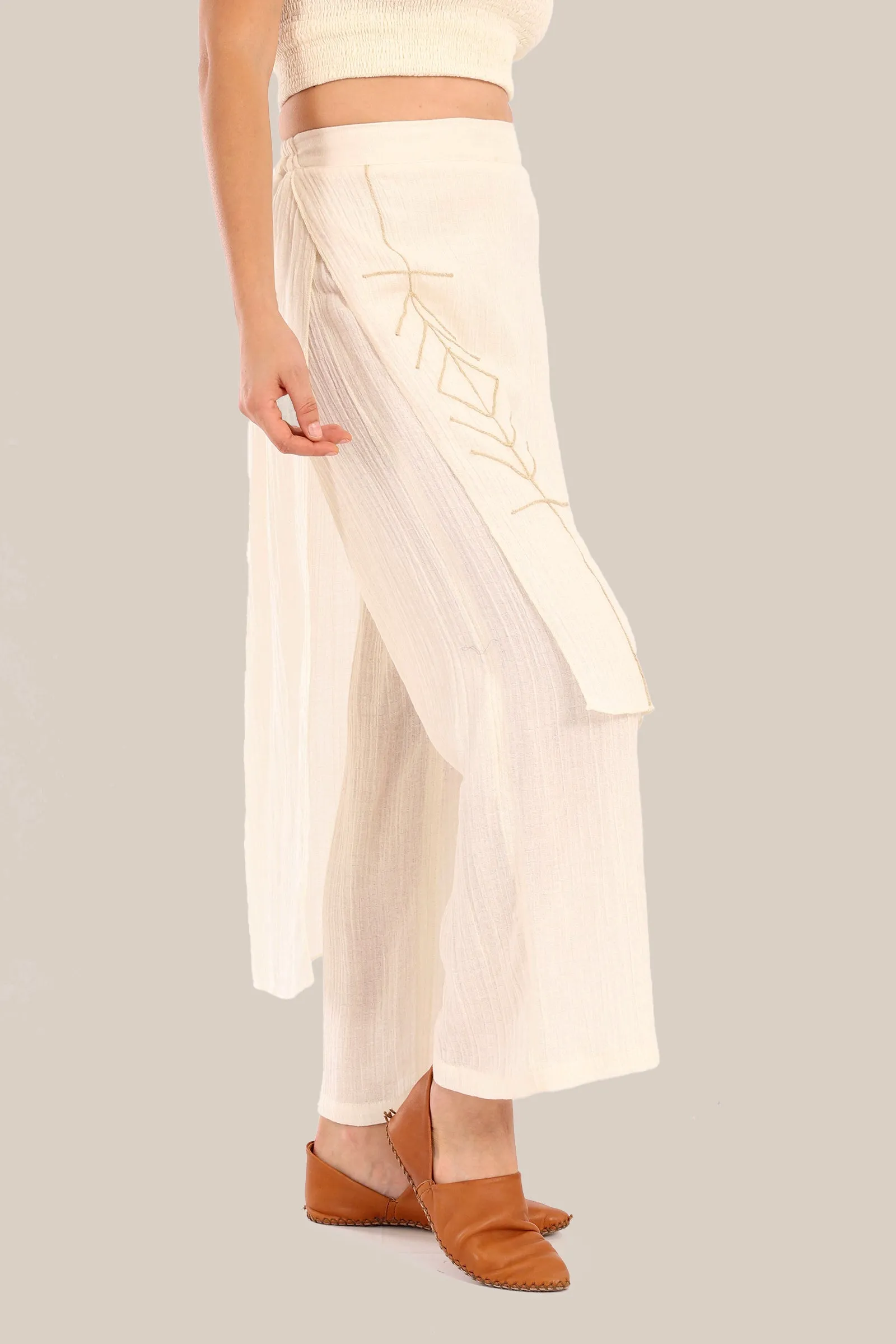Pants with an embroidered asymmetric skirt