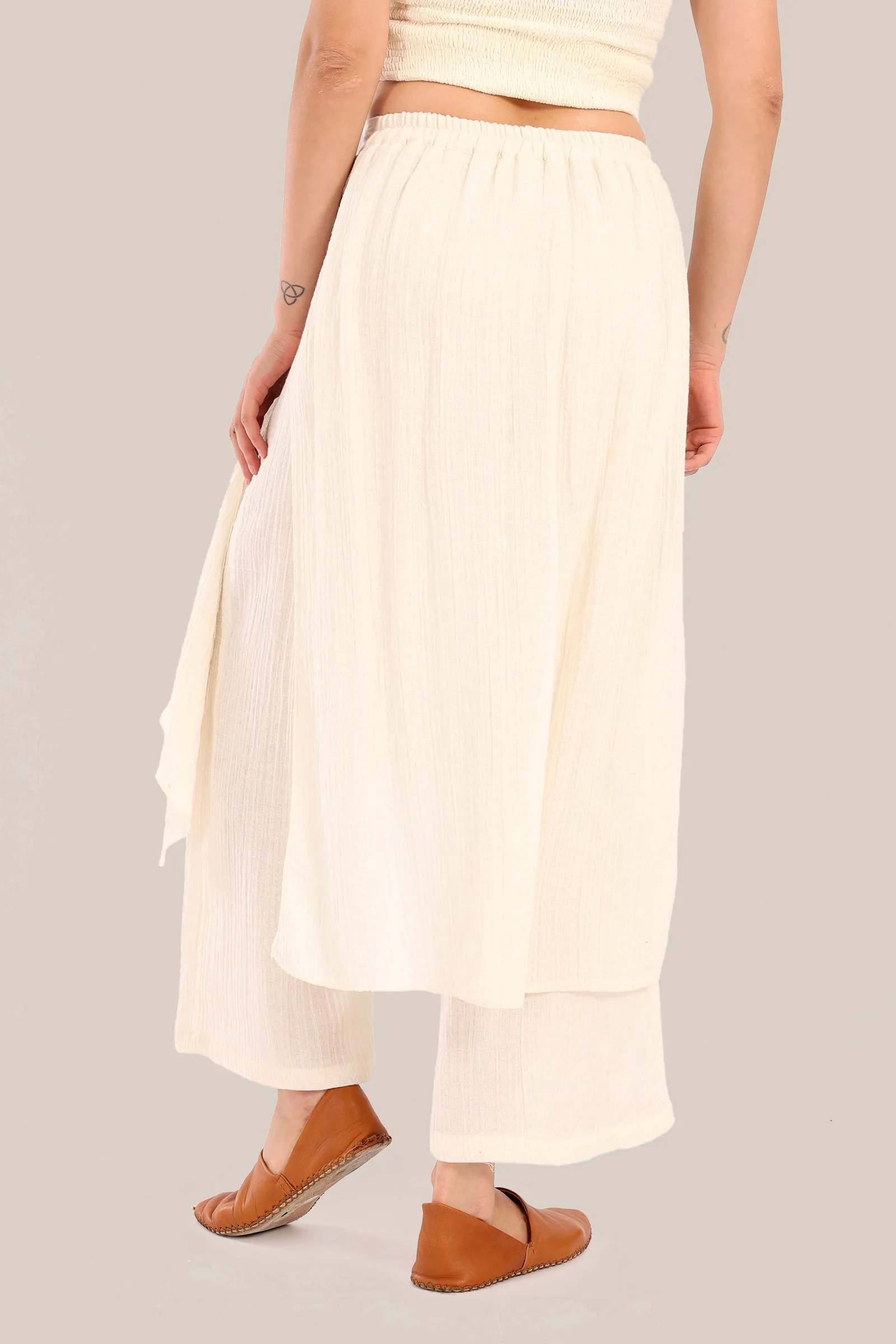 Pants with an embroidered asymmetric skirt