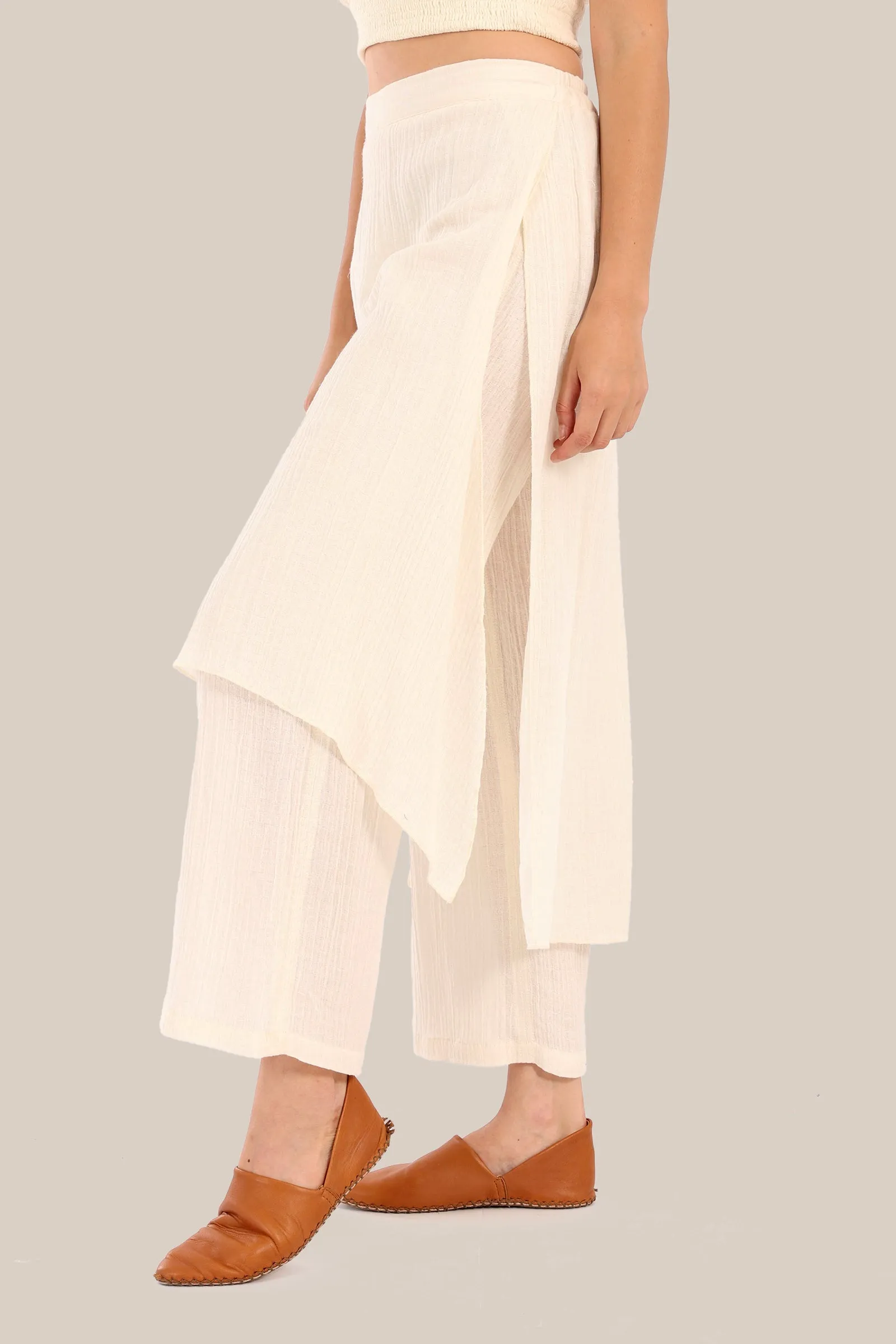 Pants with an embroidered asymmetric skirt