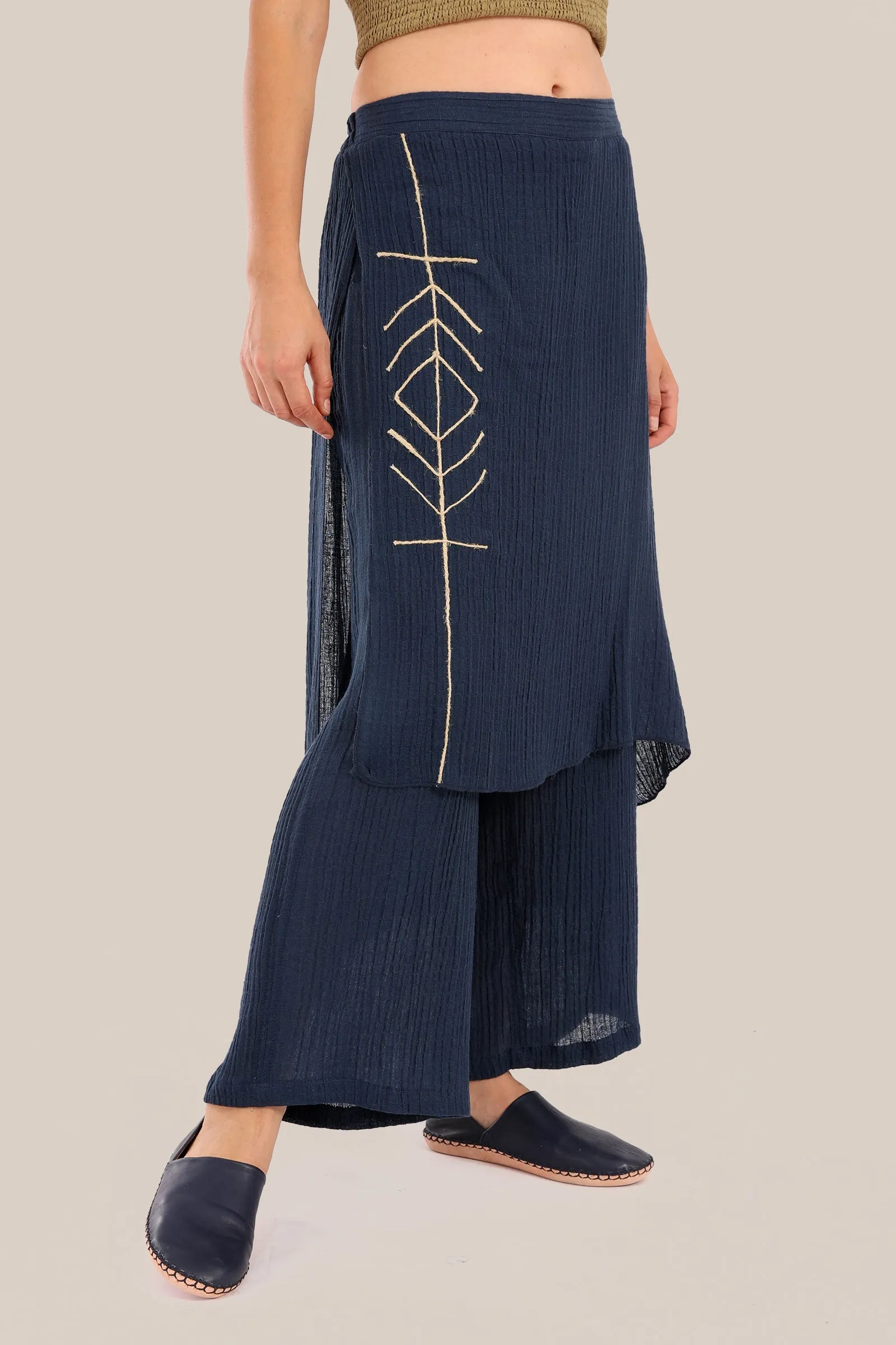 Pants with an embroidered asymmetric skirt