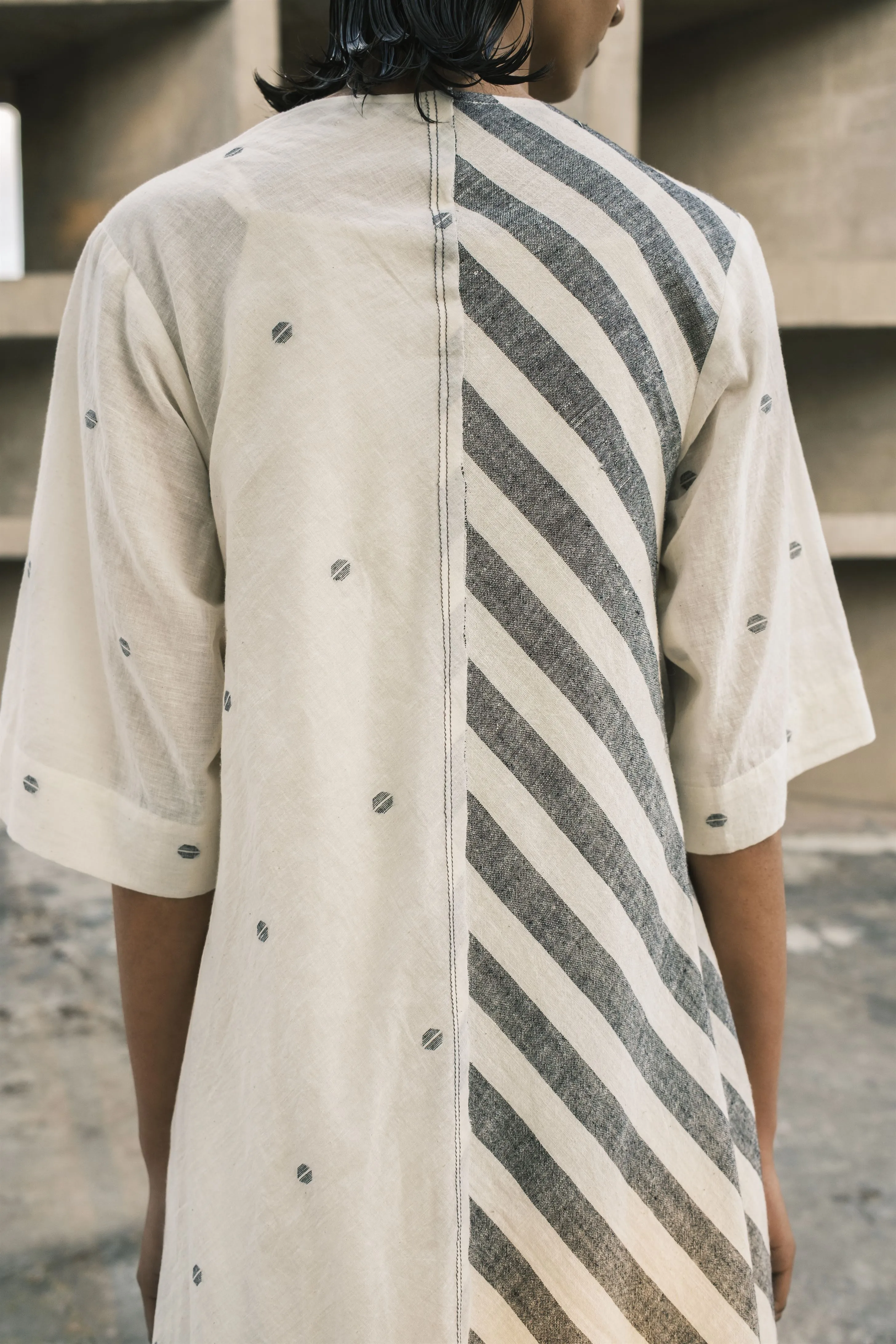 Urvashi Kaur   I   Seoul DRESS ZEPHYR hand spun cotton jamdani Shell And Charcoal TESSELLATE- 100